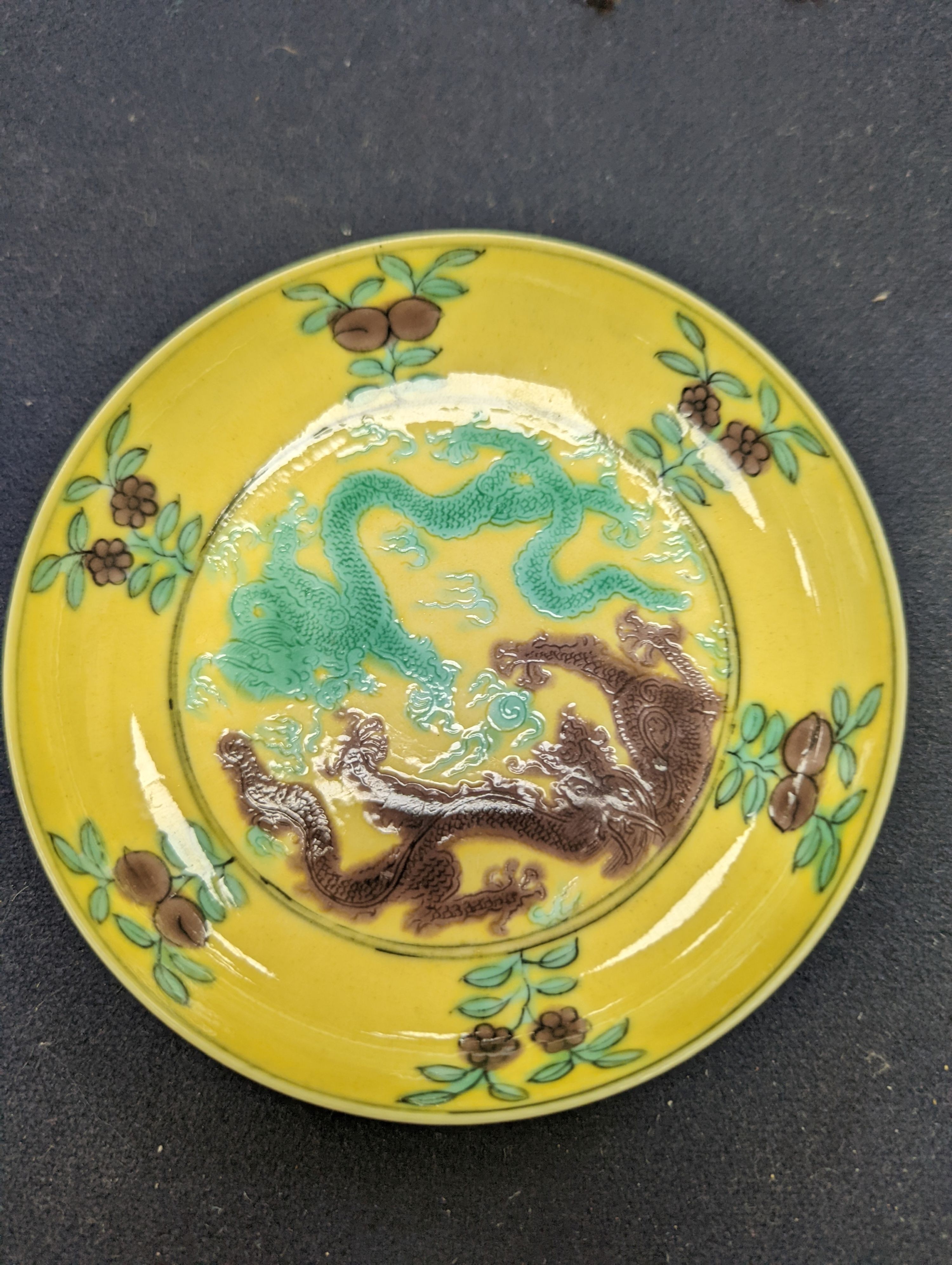 A pair of Chinese yellow, green and aubergine dragon dishes, Guangxu marks, 10cm.